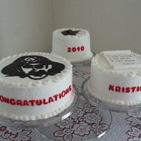 Graduation Cakes Niece's high school graduation cakes. Chocolate and vanila cakes with bc icing, mmf lettering and cut outs. gumpaste scroll.