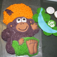 Purple Monkey i made this cake for my sister, she had this saying going as " the purple monkey ate the blue bannana". So i took the monkey pan...