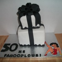 50 Is Faboopulous Black & White Betty Boop themed birthday cake for my step mom's 50th birthday.I cut and drew Betty by hand on fondant and colored...