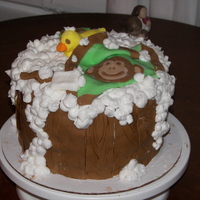 Washtub/monkey Baby Shower Cake This cake was my adaptation of a washtub cake. Three 8-inch rounds make up the cake. The "wood" is fondant strips, as is the soap...