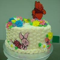 Wilton Course 2 Final Cake I wanted to do something different so I decided to do Winnie the Pooh as my run outs. Eeyore got broken so its just Pooh and Piglet.