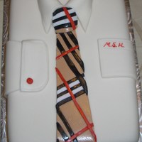 Shirt And Burberry Tie Cake Dress shirt with a Burberry tie, monogrammed pocket and cufflink. The shirt label represented the university colours.