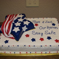Patriotic Sheet Cake This cake was for a party for a family that had 2 sons being deployed to Afghanistan at the same time. It was my first sheet cake.
