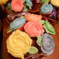 Rainbow Cupcake Bouquets Chocolate and White (done as a rainbow) cupcakes with rainbow ABC as frosting. Done with a rainbow cake for my friend's daughter'...