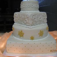 My First Wedding Cake! My very first wedding cake. 4 tiered with each cake a chocolate and white layer. Covered in fondant, snowflakes are gumpaste/fondant mix...