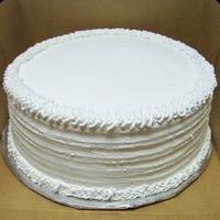 Simple White Whipped Cream Frosting Cake This is my first time using whipped cream frosting. I bought Bettercreme from a local cake supply store and thought it was wonderful to use...