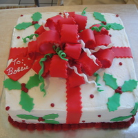 Christmas Gift This is a buttercream frosting with fondant trim. I looked at several cakes on CC site and came up with my own.