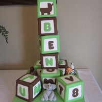 Baby Block Cake Baby Block cake I made for a baby shower. Lemon cake with raspberry filling. 4X4X4 cakes, all fondant decorations. Edible safari animals...