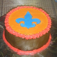 Bohemian Mother's Day Cake Dark Chocolate Cake with Chocolate Buttercream accented with RIT and more buttercream. This is a Mother's Day order that is to be...