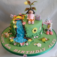 Dora The Explorer Cake This was for a friends granddaughter, who since she was one has been mad on Dora. Everything was edible, except for the tree which I wired...
