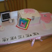 Keepsake Chest This cake was done for a friends baby shower. She is a teacher so that is why the name was in phonogram cards. The quilt was a...