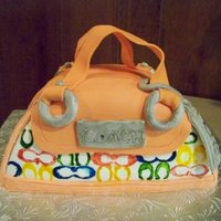 Coach Purse Coach purse cake. This was my first attempt of a purse cake. I don't think it turned out too bad ; Next time I will find an easier way...