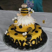 Bumble Bee Cake Yellow and Black bumble bee cake made for 2nd birthday! This cake was adorable. The flower the bee is sitting on is made of cake and I...
