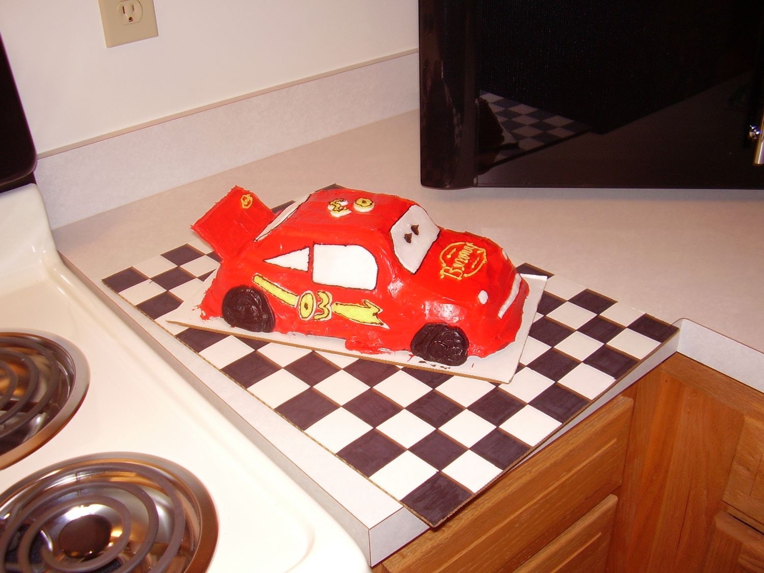 Lightning Mcqueen I made this for my 3yr olds birthday. It was my first car cake. I used the car pan. It's not the greatest but he loved it. The windows...