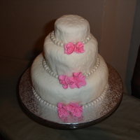 Sisters Anniversary Cake Top and bottom tier yellow cake with buttercreme icing. Middle is red velvet with cream cheese filling. I always have a problem covering my...