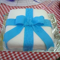 Gift Cake Yellow cake cover in fondant with bow