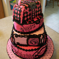 Fashionista Birthday Cake 10" round, square, oval layers. The purse on top is chocolate cake covered in MMF. I used the favor boxes to go by for the purse(my...