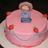 Strawberry Short Cake Cake :) My first time trying gum paste. The strawberry shortcake is all gum paste and this is my first time draping! Sooooo much fun!!!