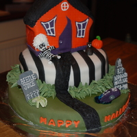 Beetlejuice Cake Halloween Beetlejiuce inspired cake. Cake in fondant and some embellishments were in gum paste. Grass on back was buttercream.