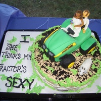 She Thinks My Tractors Sexy This dark chocolate cake is covered in butter cream that supports the tractor cake which is a pound cake with strawberry fruit filling and...
