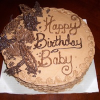 Happy Birthday Baby Dark Chocolate Cake with Milk Chocolate Buttercream decorated with basket weave and chocolate abstract leaves since it was a fall birthday...