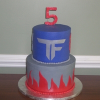 Transformers Birthday Cake Bottom Layer is Double Fudge and Top is Cherry Chip.. All BC with Fondant accents. This was my son's 5th Birthday cake and he loved it...