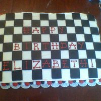 Checkerboard Birthday Cake This was made for a friends daughter that wanted a black and white checkerboard cake. She asked for a red velvet cake so I added the...