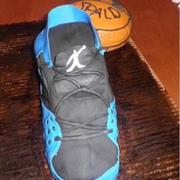 Basketball Nike Shoe Cake This was for my son's 25th birthday. He loves Nike Jordan shoes and his favorite sport is basketball. This was my first attempt at the...