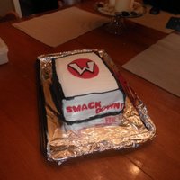 Wwe Cake Made this for my 12yr old. Got tired so I did not add the ropes and turnbucke. This is my 4th cake.