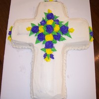Cross Cake Simple cross cake with buttercream flowers.