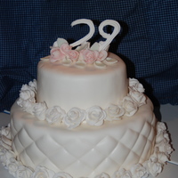 Quilted Anniversary I made this cake for my parents' anniversary a few weeks ago. Bottom tier is butter-pecan with ganache filling covered with a thick...