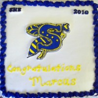 Graduation Cake Chocolate cake w/Buttercream icing. The logo is a FBCT. TFL
