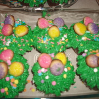 Easter Cupcakes Vanilla cupcakes with BC grass and sugar cookie eggs.