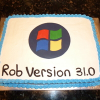 Microsoft Windows Cake Vanilla cake with butter cream icing and fondant windows logo on top.