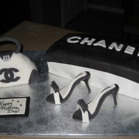 Chanel Purse And Shoe Cake This cake was made for my mom for Mother's Day. It was my first time ever to do a purse, shoes, or shoe box. It was a learning...