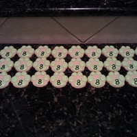 Paw Print Cookies These cookies were made for an 8 year old's birthday party. Her request was paw prints with green icing and the number 8 on them.