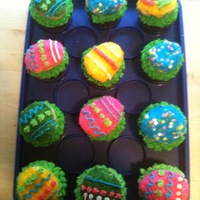 Easter Cupcakes Eggs are sugar cookies on top of chocolate cupcakes