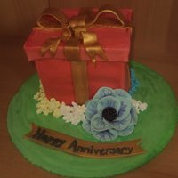Anniversary Gift Box Cake This cake was very challenging! I never made a gift box cake nor did I have any idea on how to do it... and I suck at following directions...