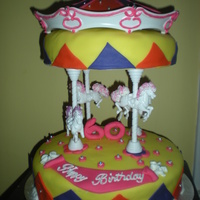 Carousel Cake Lemon and Marble Fudge cakes with buttercream, fondant and coloured sugar accents. tyfl
