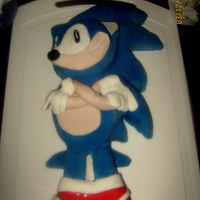 3D Sonic The Hedgehog My First ever 3D cake Sonic the hedgehog for my sons 6th Birthday. All sponge cake covered in coloured Royal Icing.