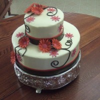 Klcake Cream cheese frosting, fondant vines, gumpaste flowers