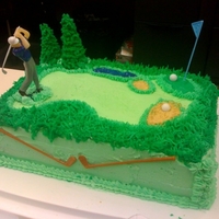 Golf Cake This was a cake that I made for a coworker's birthday. It's all buttercream except for the golfing items. I also call cake a &...