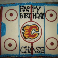 Calgary Flames Birthday Cake This cake is carrot cake with cream cheese frosting. There are lots of little imperfections, but overall i'm quite happy at how it...