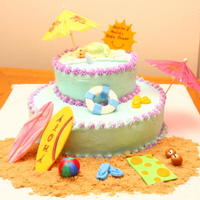 Beach Theme Baby Shower Cake 6 inch on top of 10 inch cake with BC icing and fondant accents