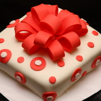 Gift Cake This was my first time making a bow and homemade MMF.