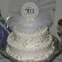 30Th Anniversary This is a 30th Anniversary cake I made for my mom's friend. Simple design with buttercream borders and curling ribbon accents.