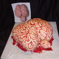 Think Halloween cake, buttercream and fondant. Raspberry filling taste great too!