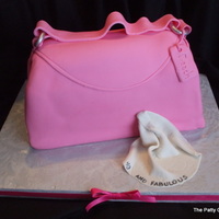 In Style Purse cake and buttercream covered in fondant.