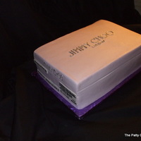 Glorious Shoes!!!!! Buttercream with fondant labels.As usual, what looks easy is a terror. Every imperfection shows like a beacon.