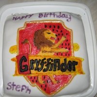 Gryffindor Cake Created for Stephanie's birthday, I used a reference picture of the gryffindor badge and then copied it onto the cake.